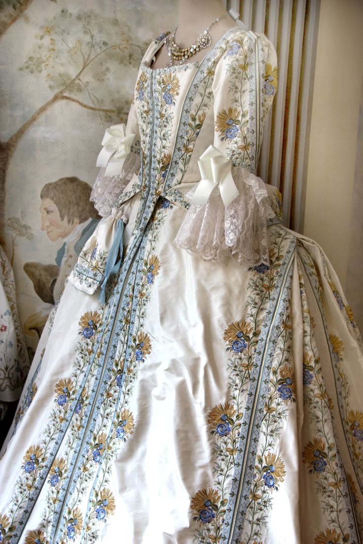 Blue fantasy cosplay crown and ornate accessory details.